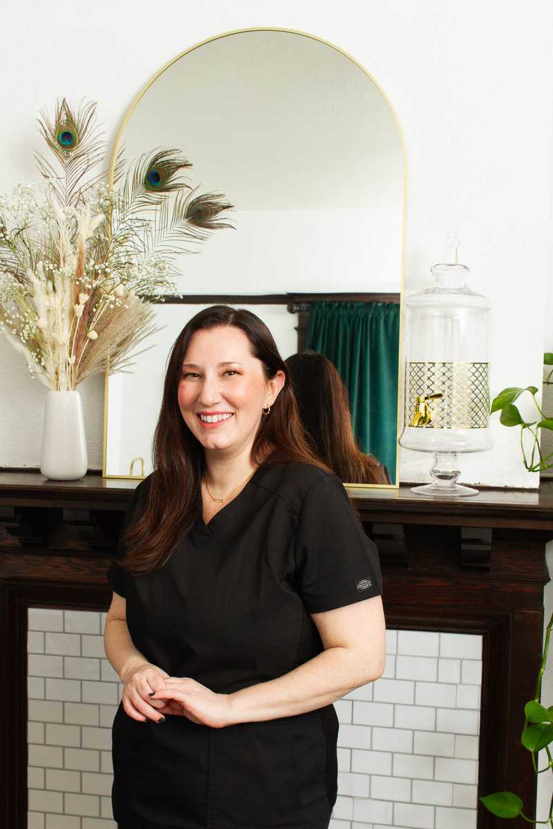 Personal branding portrait and professional headshot of Portland esthetician Kate in her studio