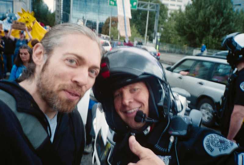 Selfie with a police officer at the global climate strike in Portland, OR on 09/20/19
