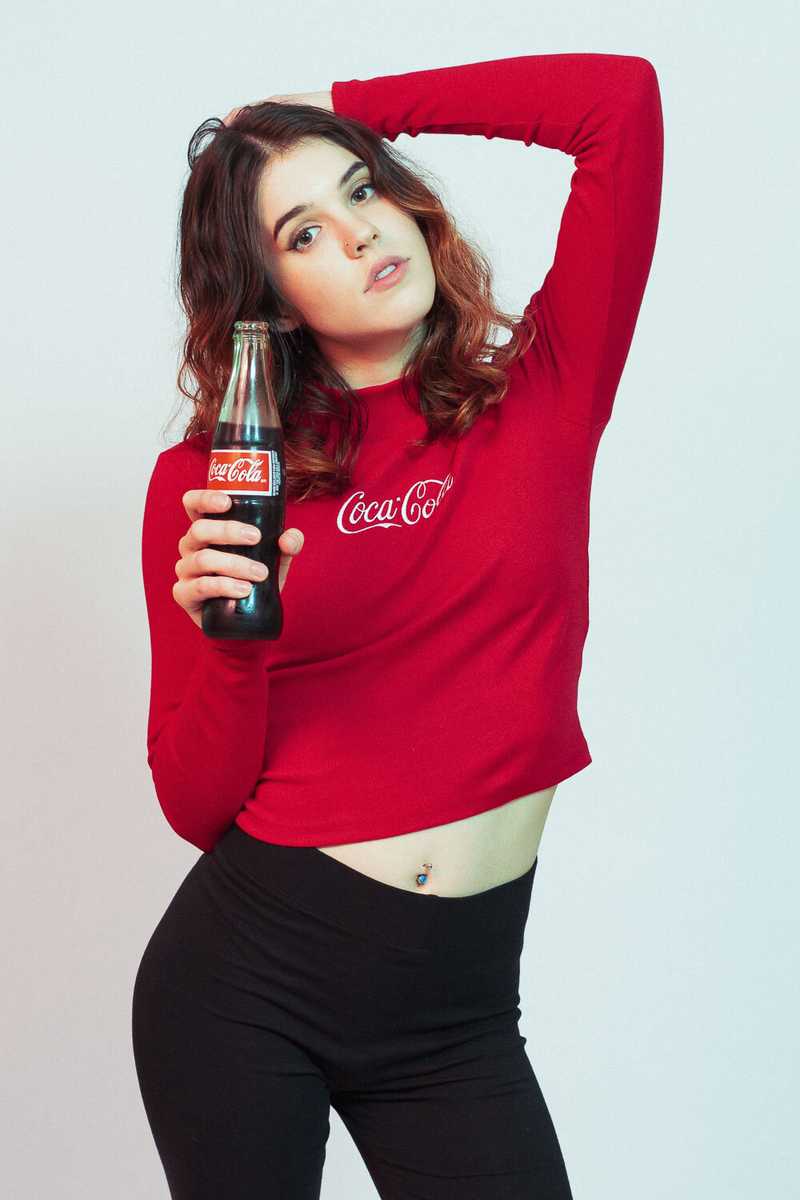 Model drinking america's favorite sugary beverage